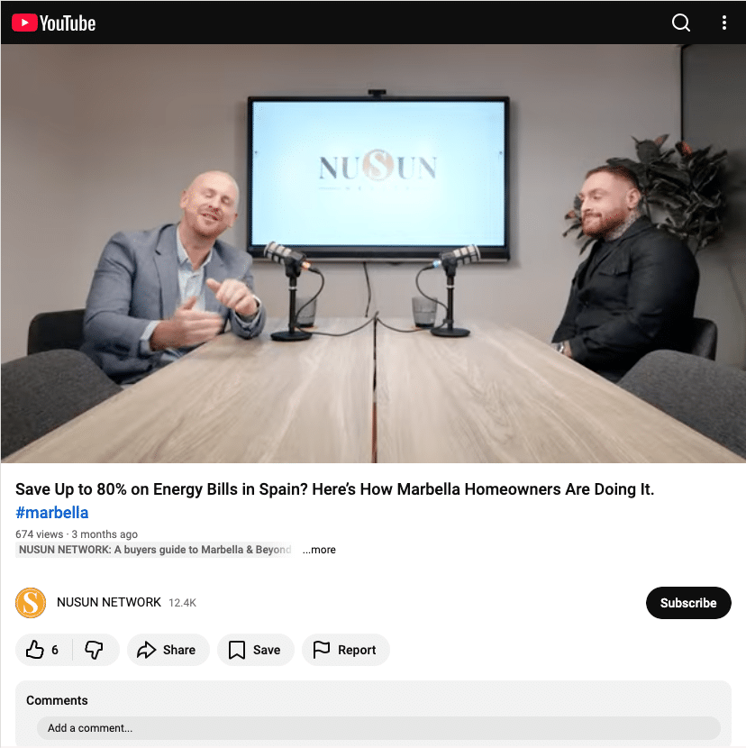 Two men sit at a long table with microphones in a studio, a screen behind them shows the NUSUN logo, as if recording a podcast or interview.